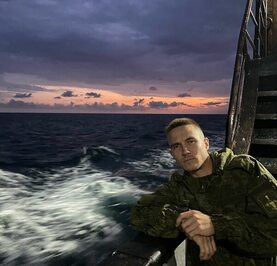 Николай